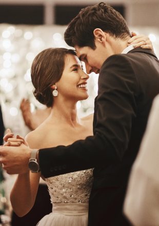 Cropped shot of an affectionate young newlywed couple dancing alongside their guests on their wedding day